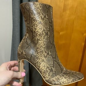 Ankle heeled snake print boots